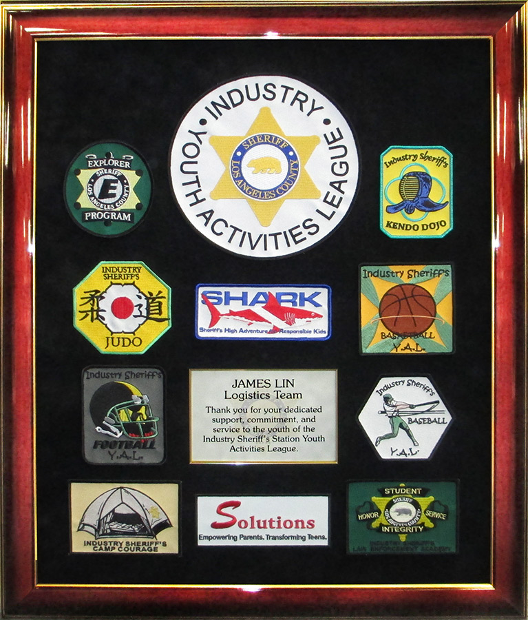 LASD- Youth
          Activities League presentation from Badge frame